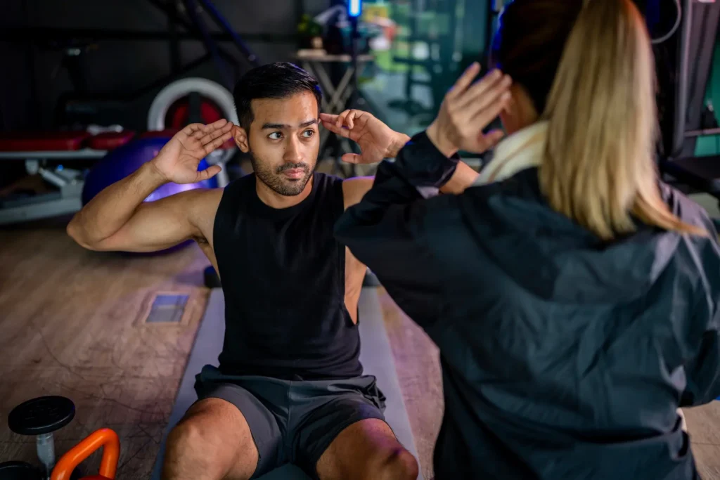 asian man and woman working out one is a trainer 2025 03 15 18 38 36 utc